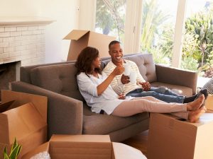 A couple moving in to their new home
